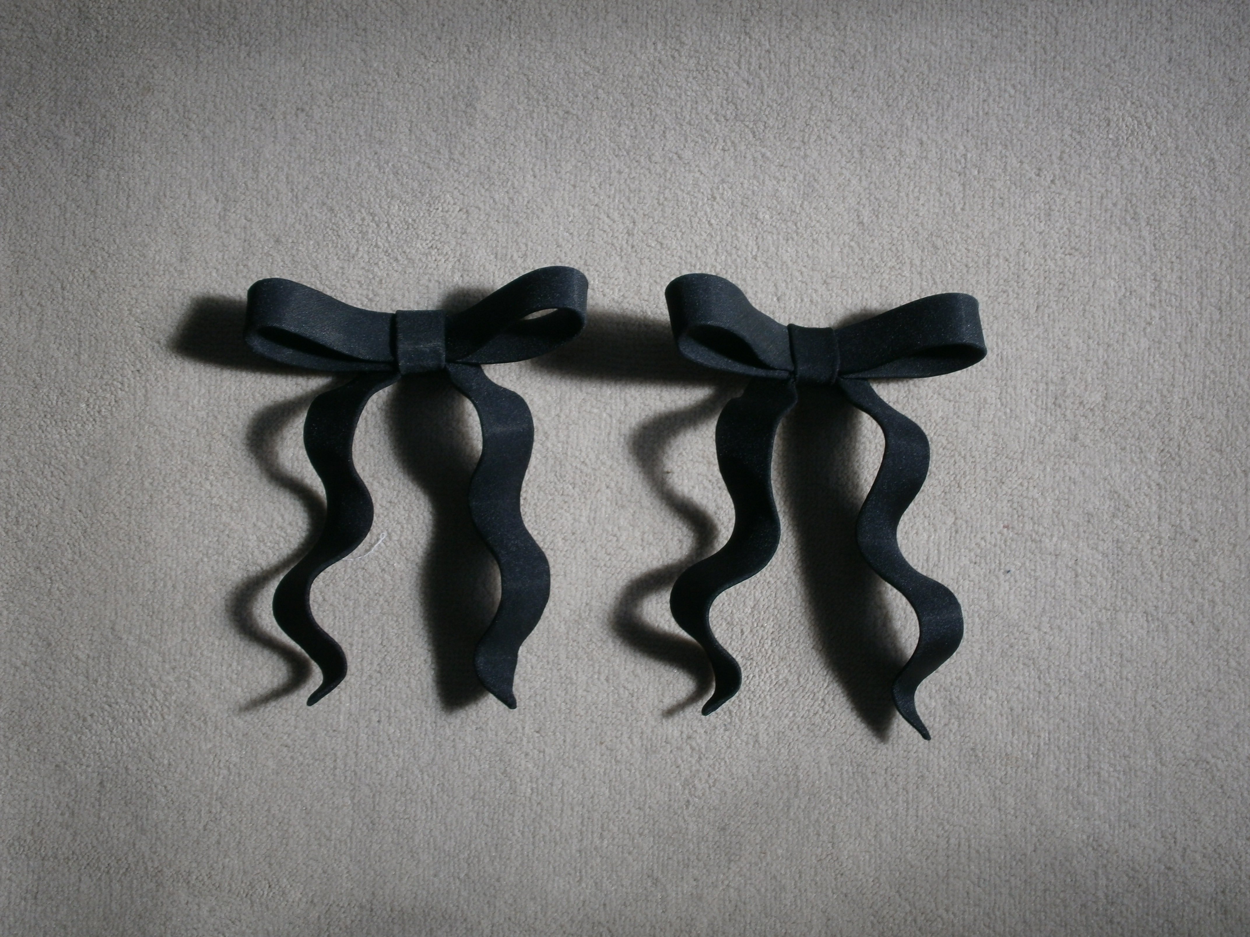 Black twin bows